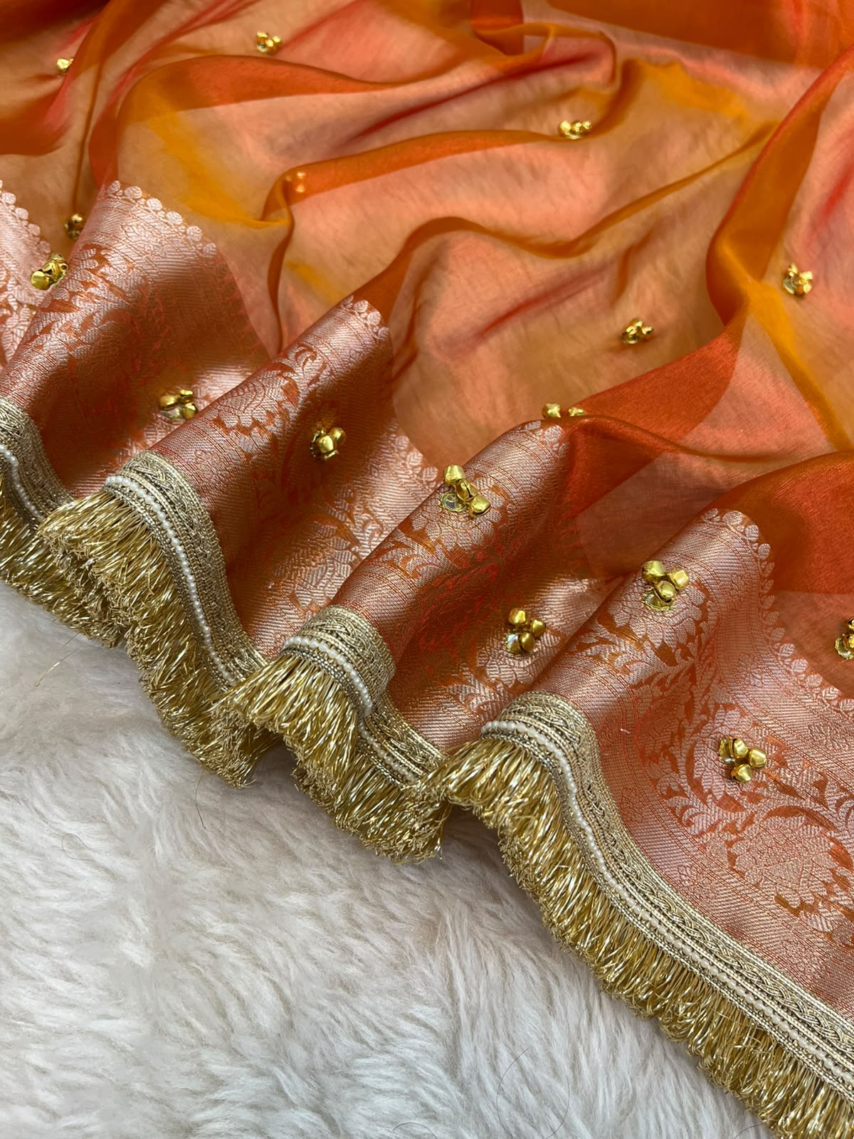 Rust Orange Soft Tissue Silk Saree with Ghungroo & Zari Border Work