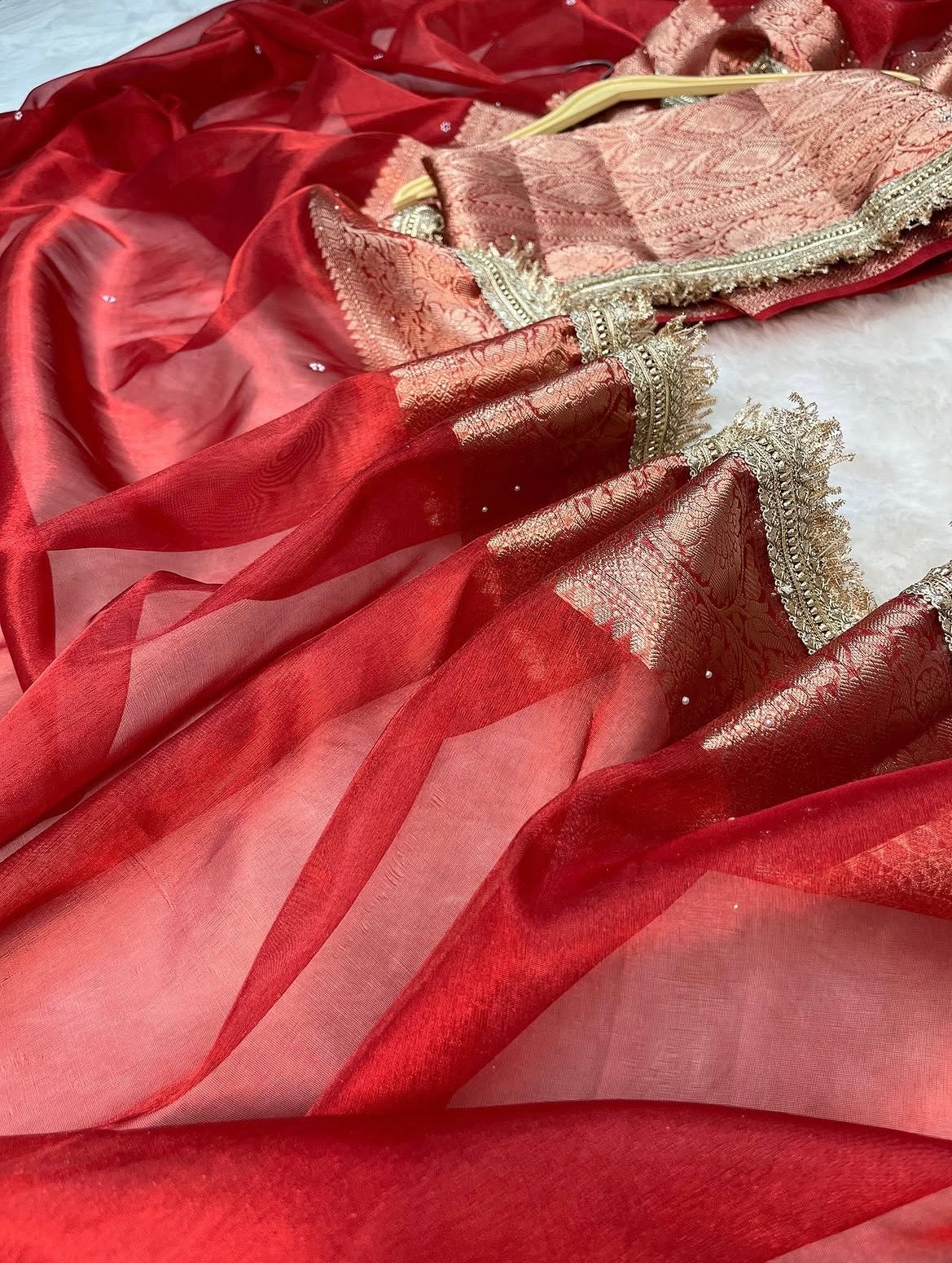Crimson Red Maharani Tissue Silk Saree with Banarasi Zari Pallu,Intricate Stonework,and Designer Lace Border
