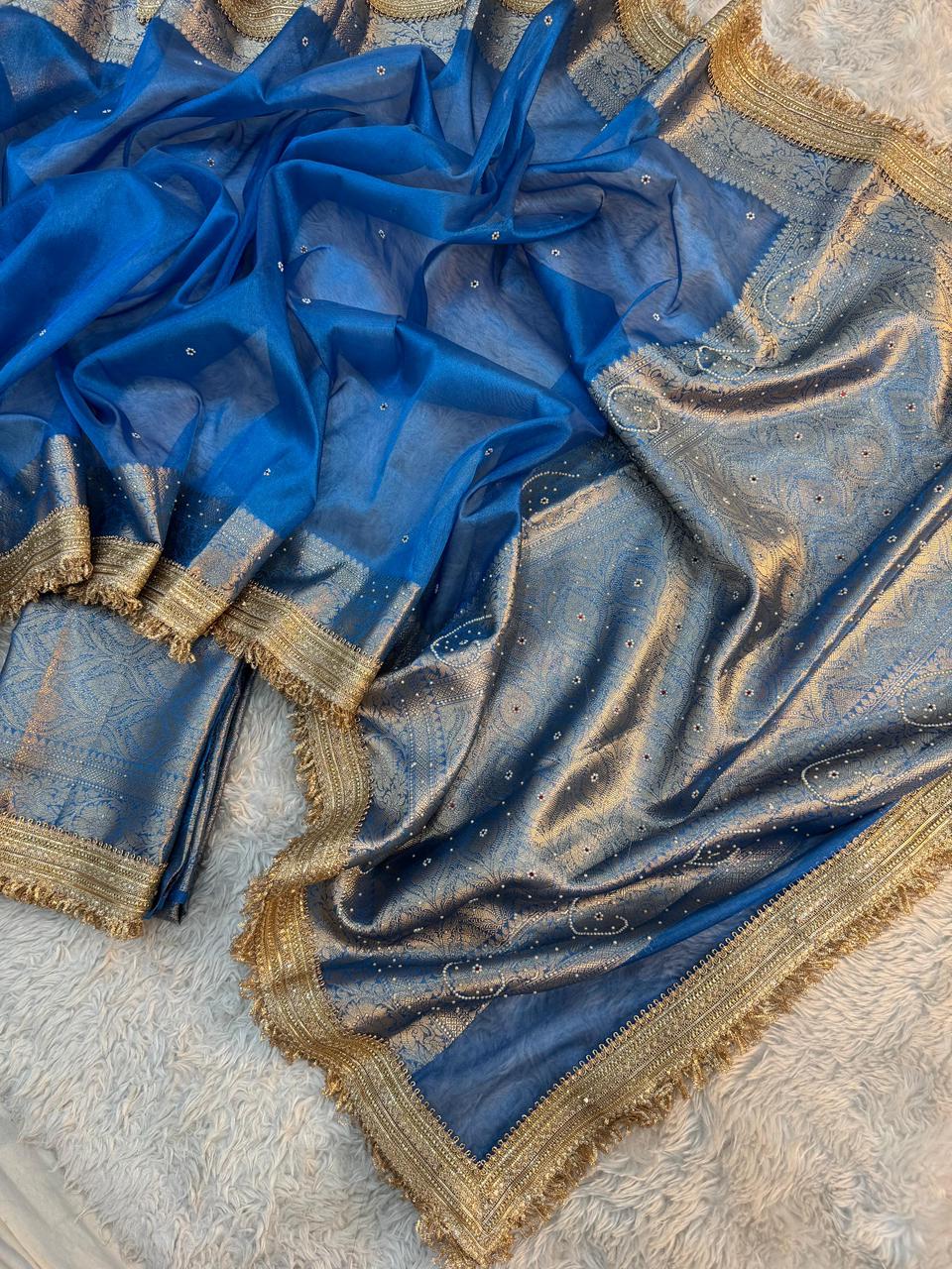 Prussian Blue Maharani Tissue Silk Saree with Banarasi Zari Pallu,Intricate Stonework,and Designer Lace Border
