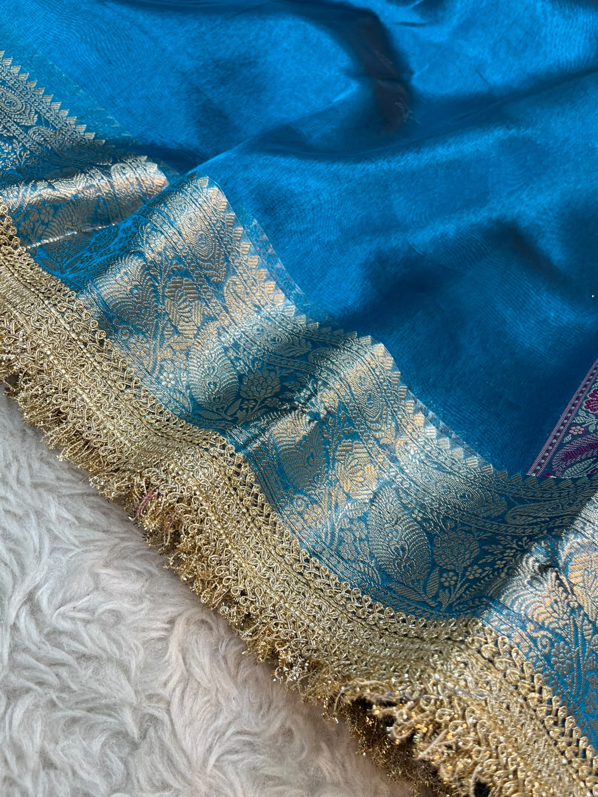 Crystal Blue Pashmina Tissue Silk Saree with Wine Paisley Pallu and Attached Kiran Lace Border