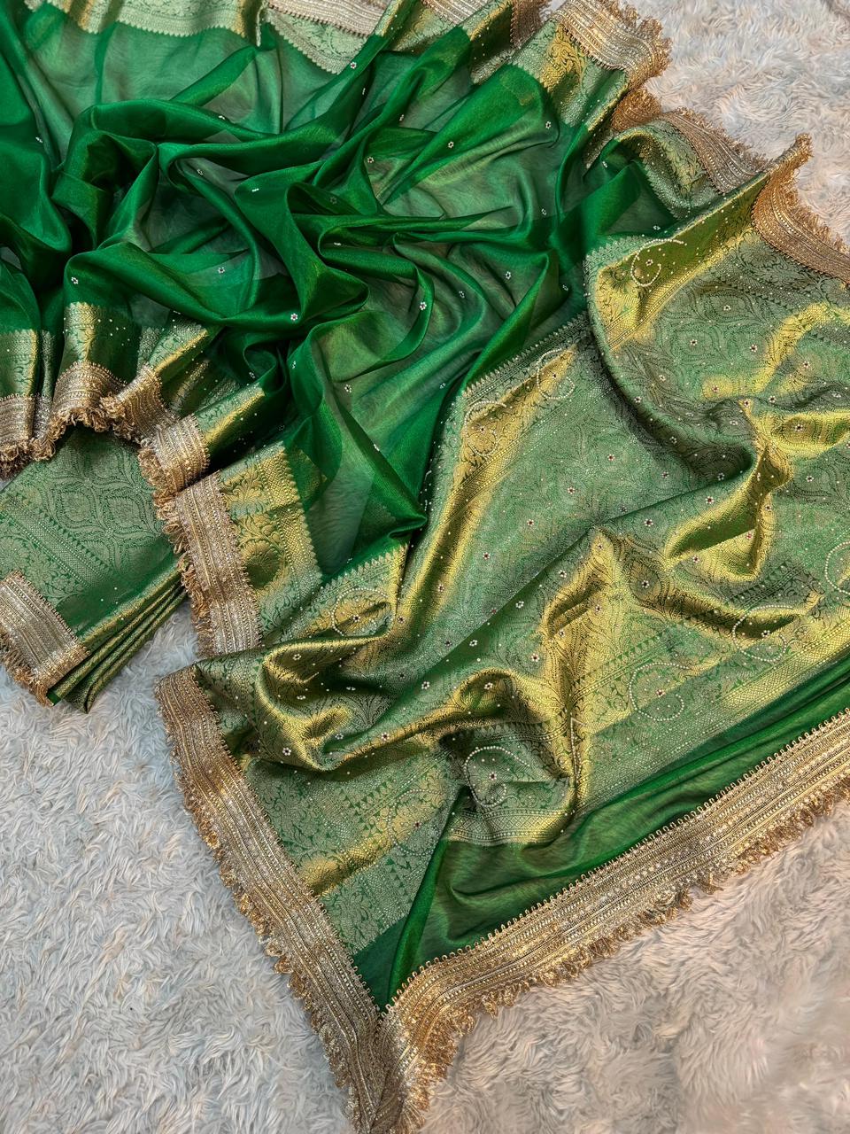 Rama Green Maharani Tissue Silk Saree with Banarasi Zari Pallu,Intricate Stonework,and Designer Lace Border