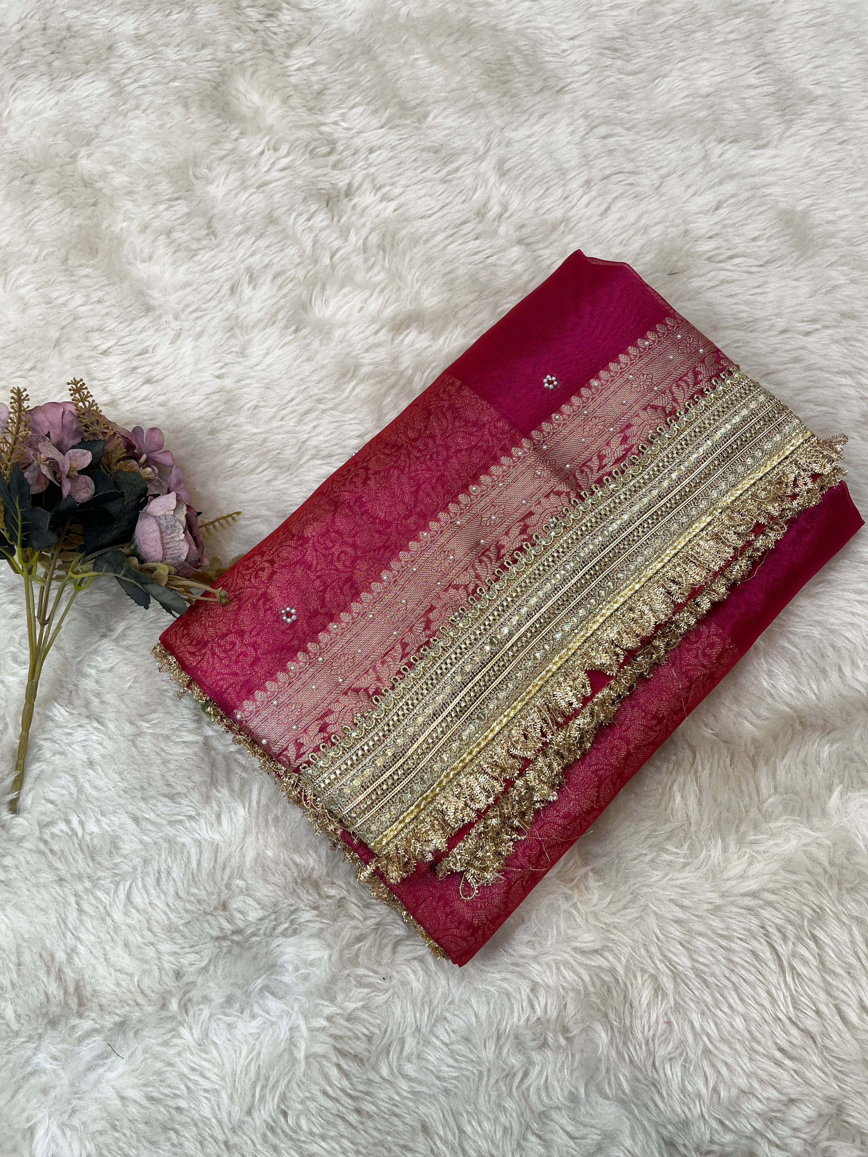 Rani Pink Maharani Tissue Silk Saree with Banarasi Zari Pallu,Intricate Stonework,and Designer Lace Border