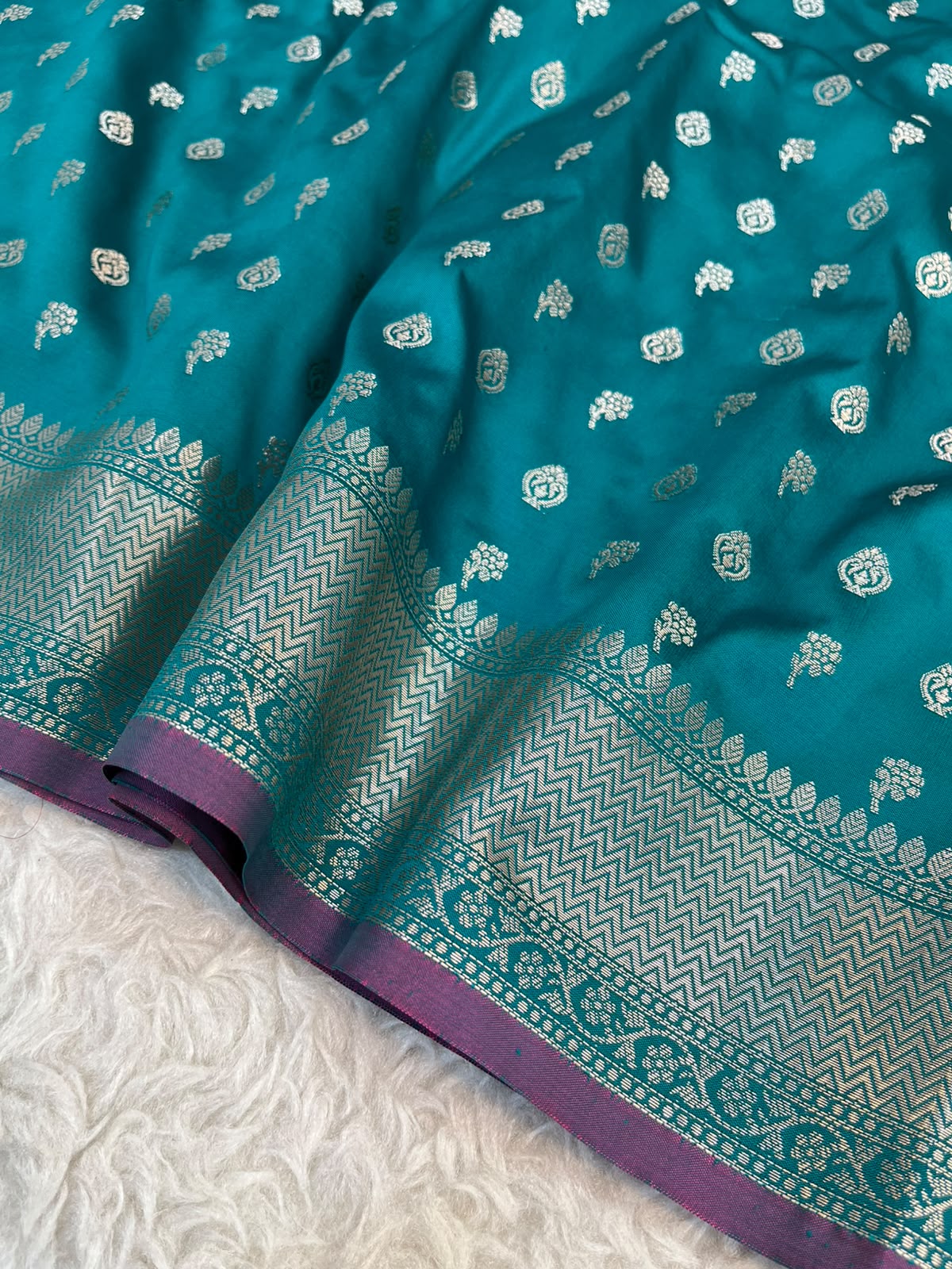 Teal Blue Banarasi Soft Katan Silk Saree with All-Over Zari Buti & Rich Pallu