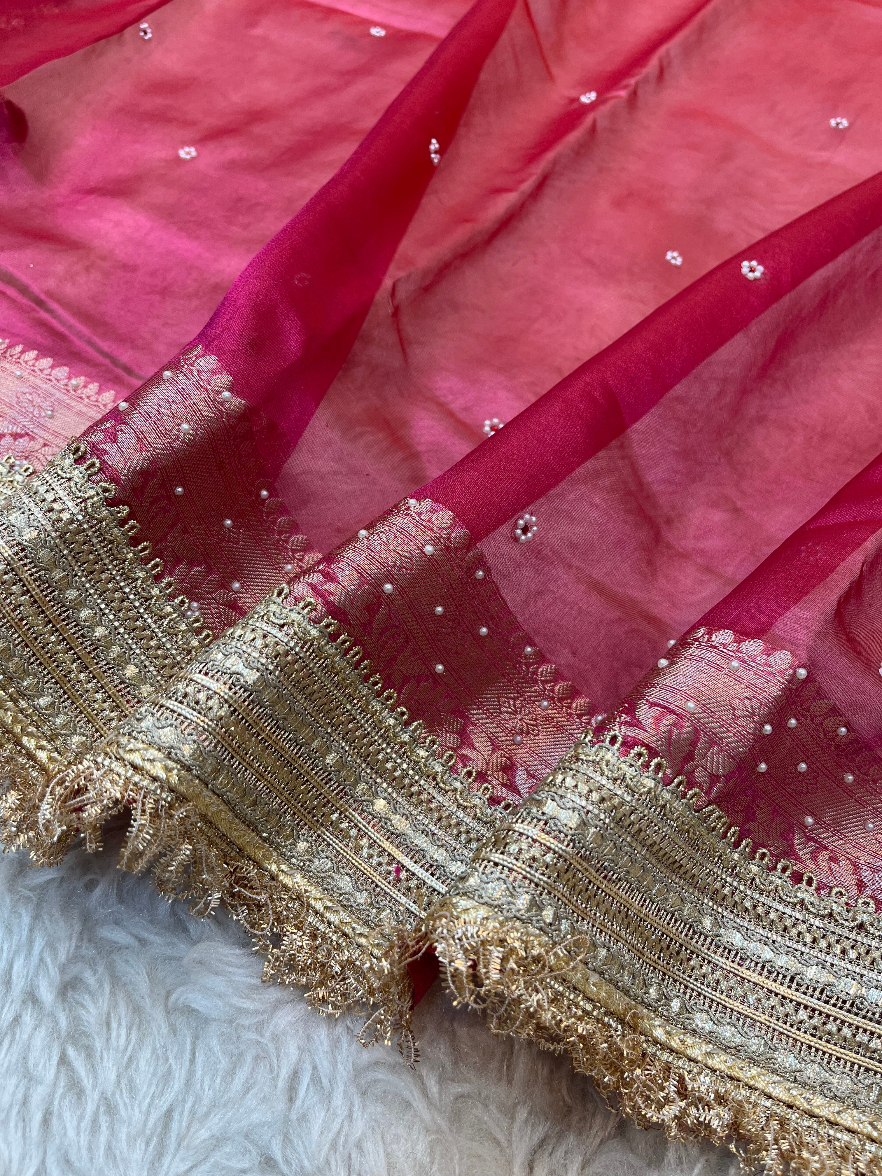 Rani Pink Maharani Tissue Silk Saree with Banarasi Zari Pallu,Intricate Stonework,and Designer Lace Border