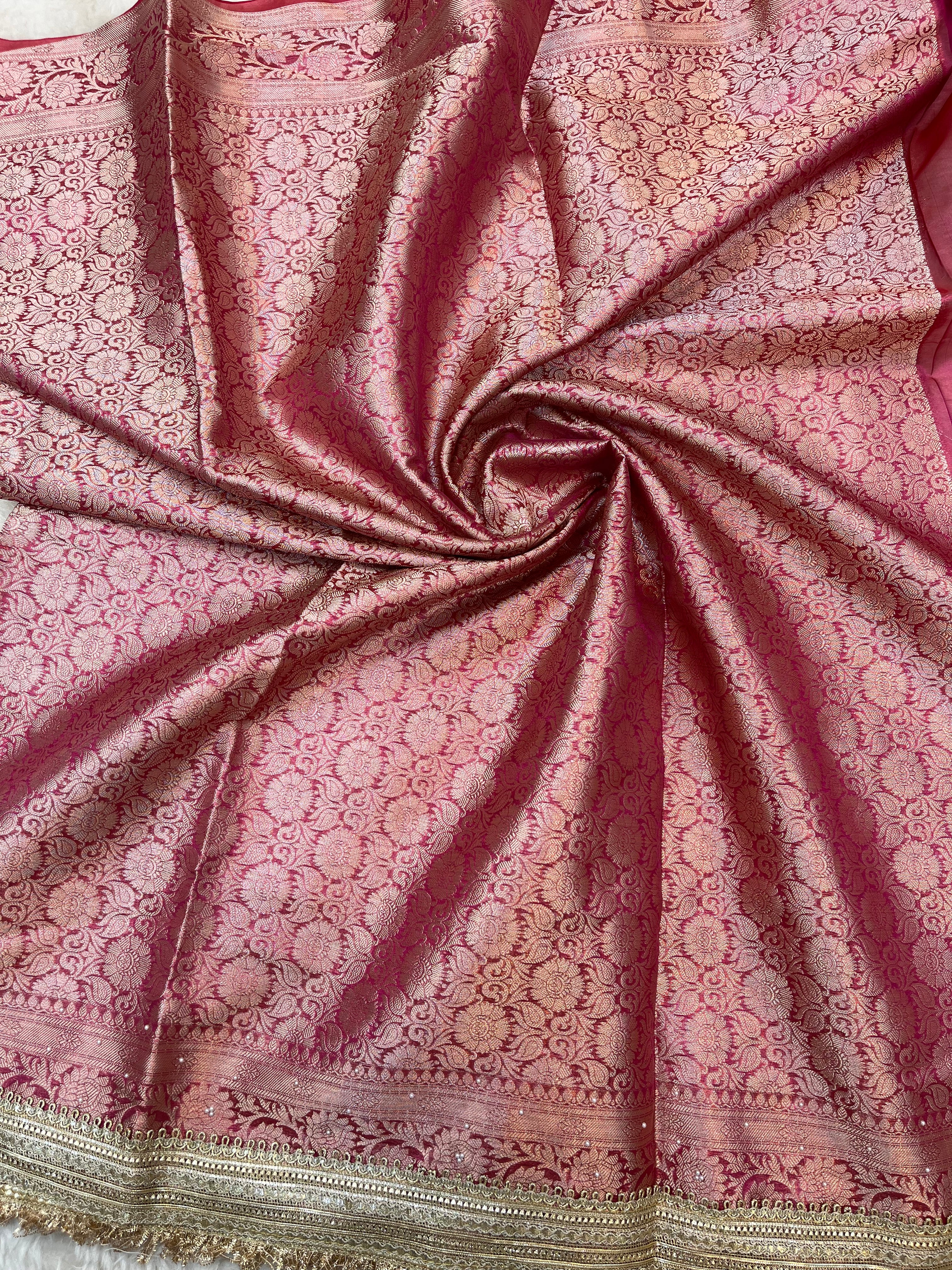 Rani Pink Maharani Tissue Silk Saree with Banarasi Zari Pallu,Intricate Stonework,and Designer Lace Border