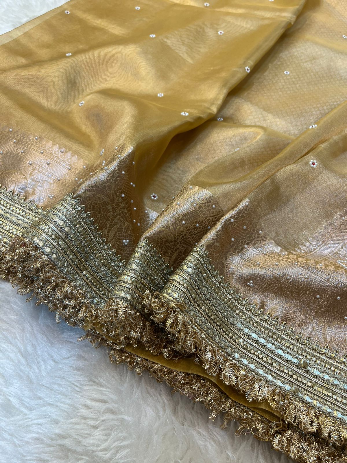 Metallic Beige Maharani Tissue Silk Saree with Banarasi Zari Pallu,Intricate Stonework,and Designer Lace Border