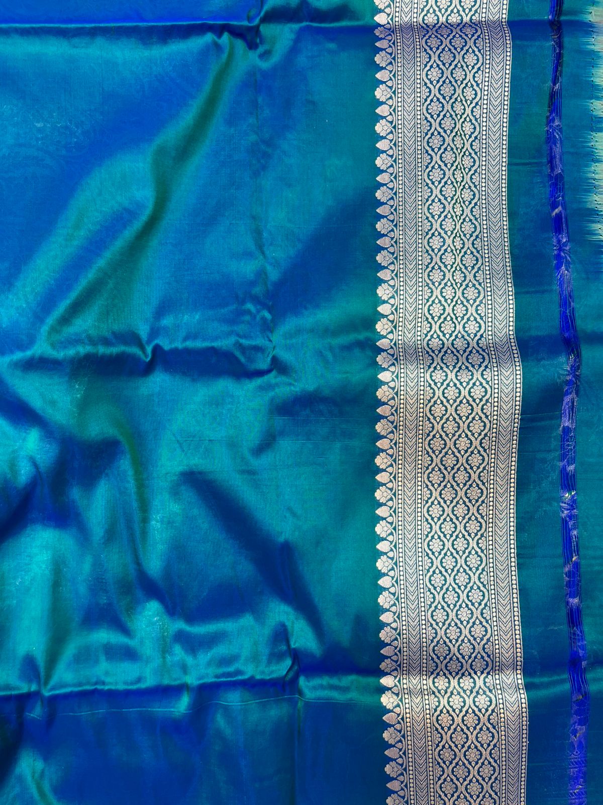 Peacock Blue Pure Katan Silk Banarasi Saree with Gold Zari Jangla Jaal