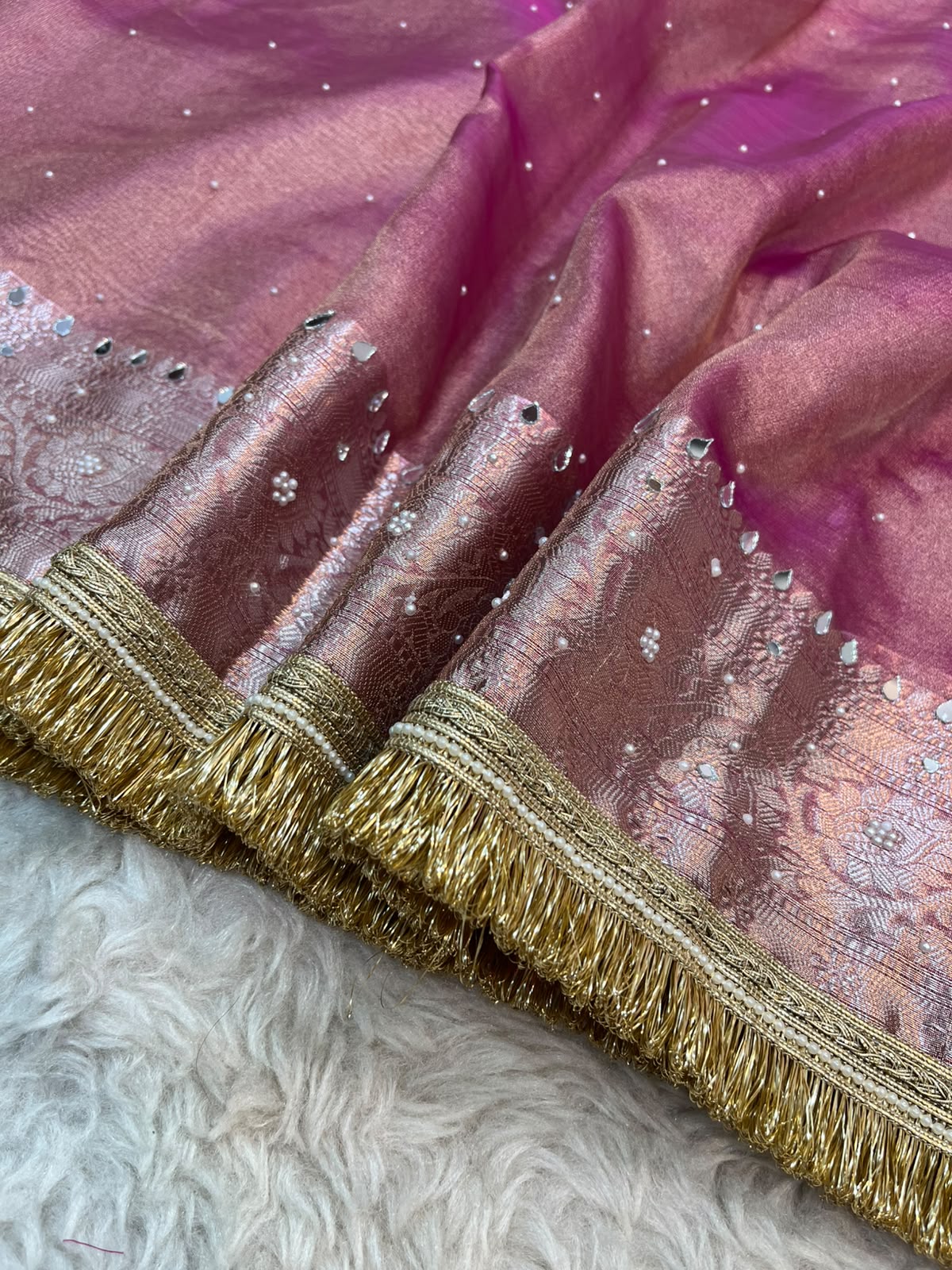 Tissue Silk Saree in Rose Pink – Mirror & Stone Handwork with Traditional Fringe Lace Border