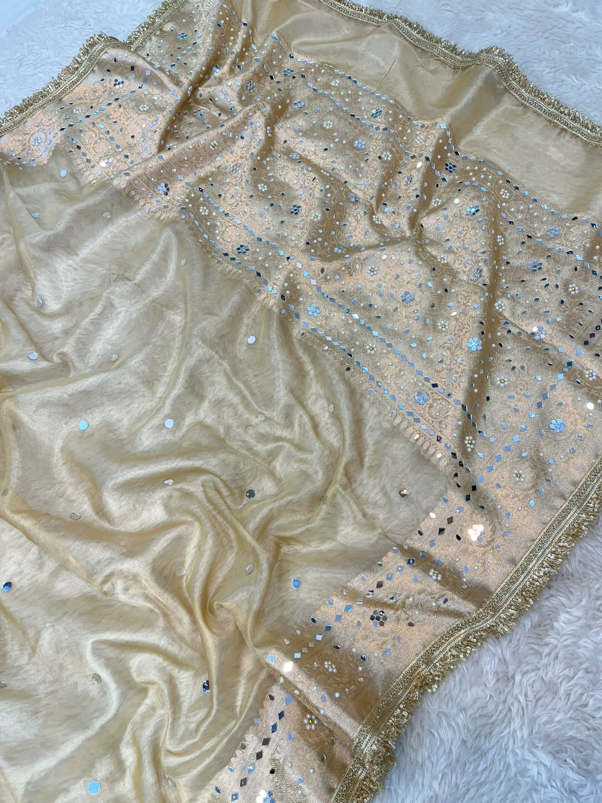 Soft Gold Tissue Silk Saree Featuring Mirror Work & Lace Border