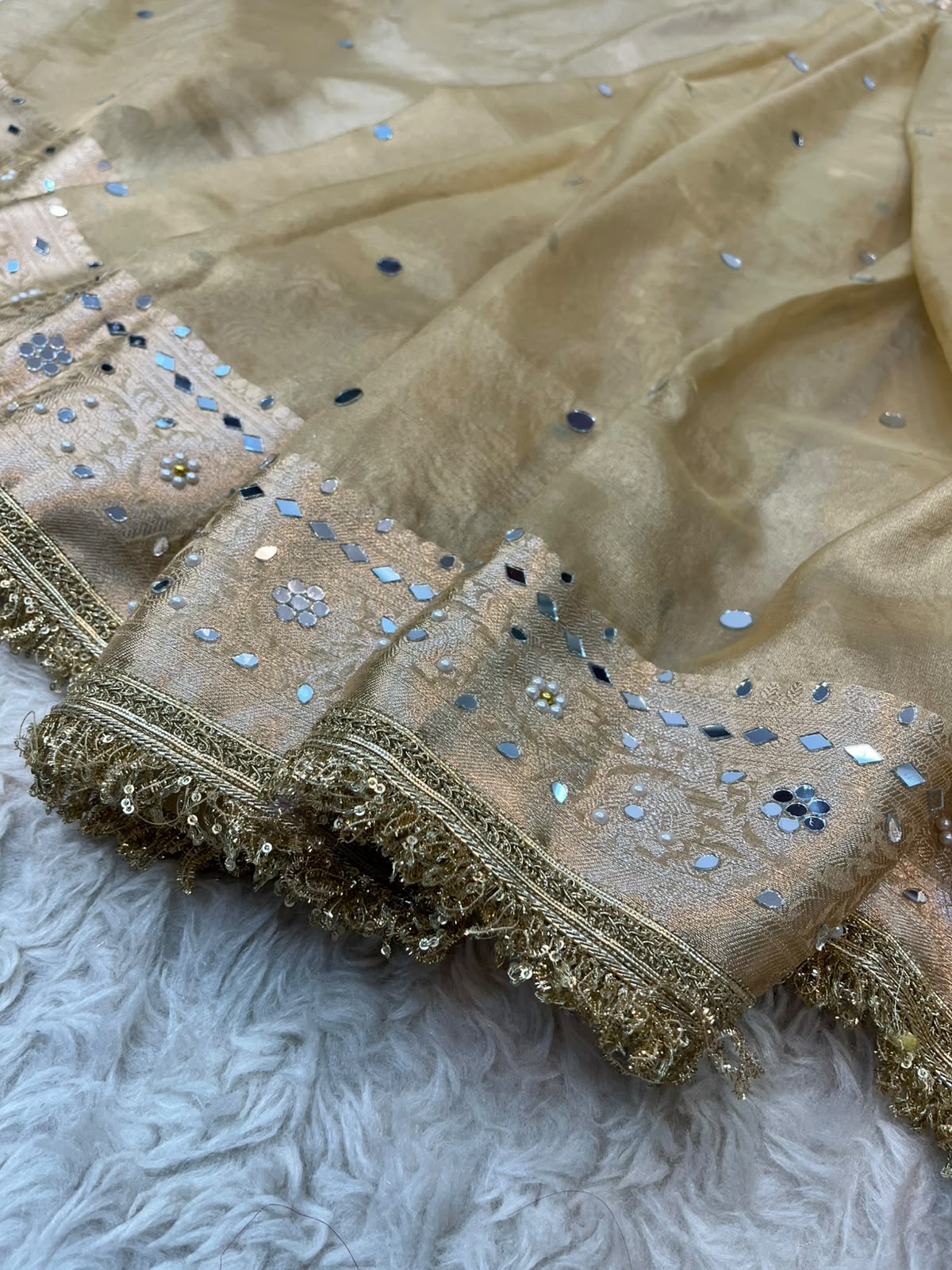 Soft Gold Tissue Silk Saree Featuring Mirror Work & Lace Border