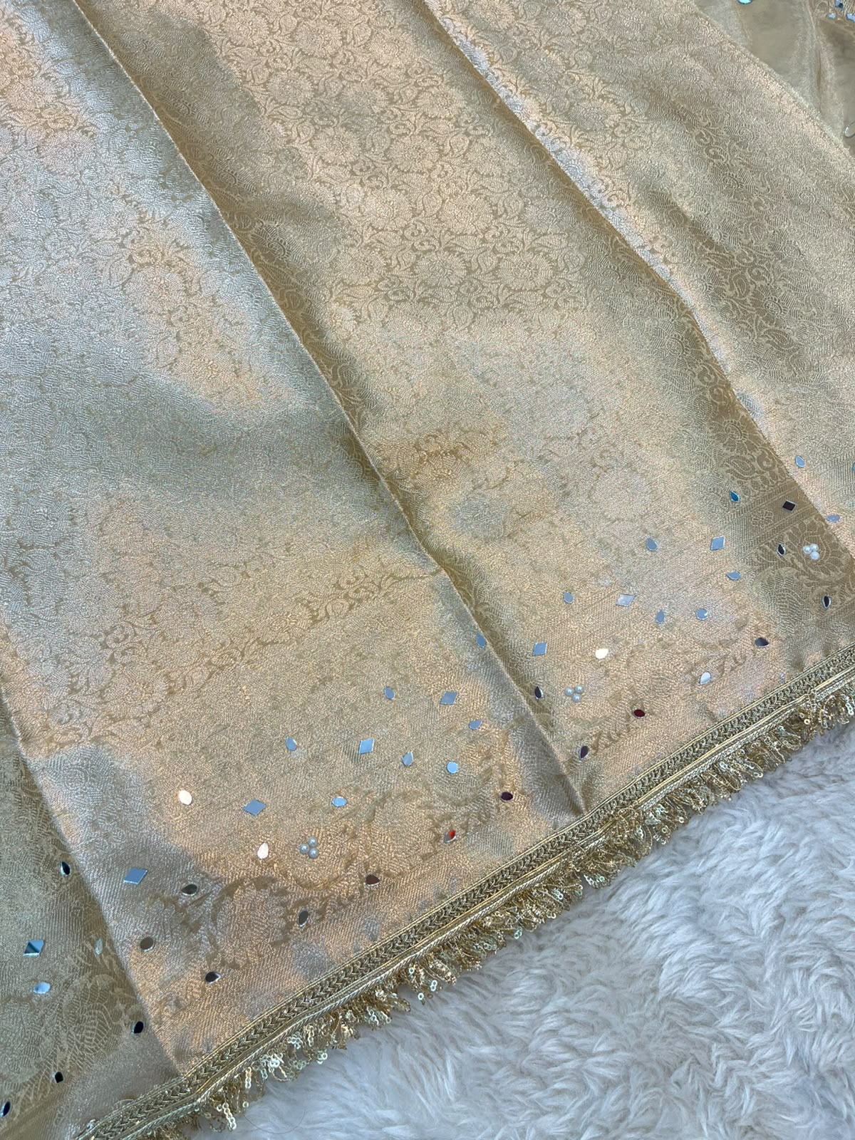 Soft Gold Tissue Silk Saree Featuring Mirror Work & Lace Border