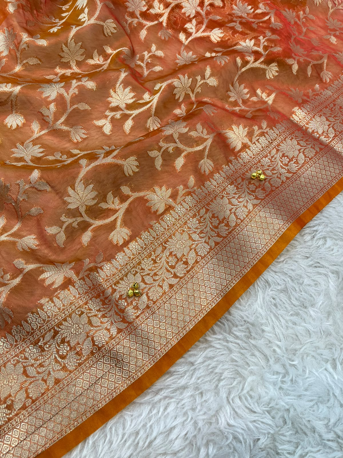Fanta Orange Tissue Silk Saree Embellished with Ghungroo Motifs & Floral Brocade Pallu