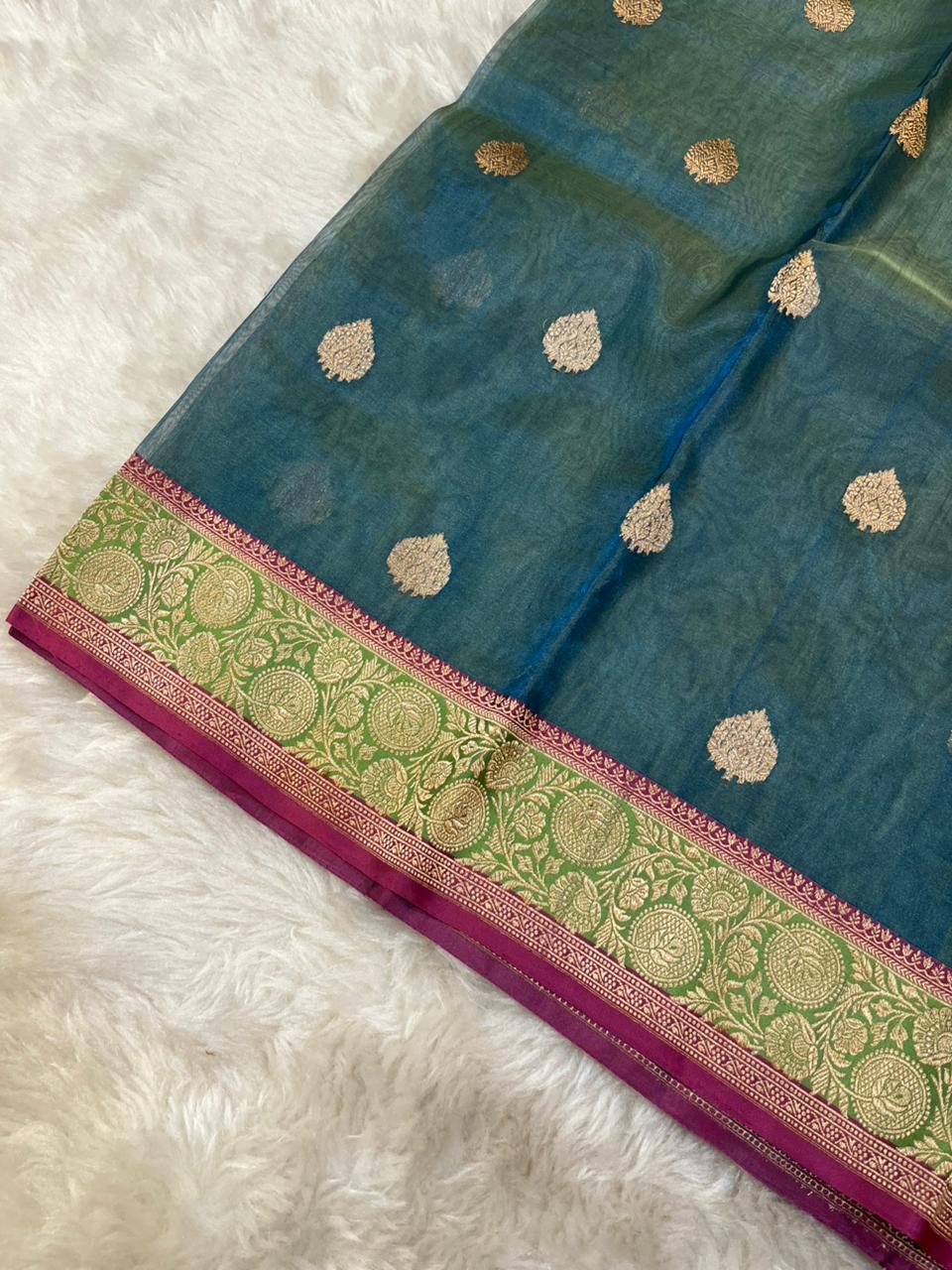 Luminous Teal Blue Pure Tissue Banarasi Saree with Zari Butis & Contrast Pink-Green Border